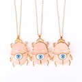 Pink crystal beetle pendant necklace with blue eye detail on a gold chain for women - Rose Quartz (No Chain)