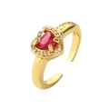 Goldener Herzring mit rotem Zirkon und LOVE Gravur auf weißem Hintergrund - Einstellbar Offen / Rote LOVE Stil