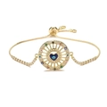 Adjustable golden heart evil eye bracelet with colorful zircons on white background - Metal Chain Style / Gold + Black Heart + Tennis Chain