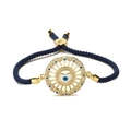 Verstellbares Evil Eye Armband geflochten mit blauem Herzanhänger und Golddetails - Blau