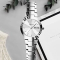 Silver stainless steel watch with white dial and day-date window on lifestyle background - Silver White Dial [Day Date]