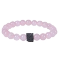 Close-up of pink translucent beads and a black square lava stone on an elastic bracelet - Pink Crystal