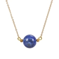 Detailed macro view of 16mm round blue lapis lazuli stone pendant on a gold link chain - Dark Blue