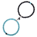 Dettaglio dei bracciali di coppia in pietra zebra rosa con chiusura magnetica a cuore - Bracciale Turchese + Pietra Opaca