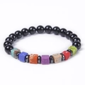 Close-up of seven chakra beaded bracelet with colorful square stones on black beads - Obsidian