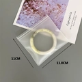 Close-up of translucent frosted EVA jewelry bag with zipper lock for bracelet storage - 40 Silk Frosted Self-Sealing Bag / 11.8x11cm