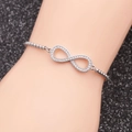 Adjustable infinity symbol bracelet in polished silver stainless steel with micro-inlaid stones - White Zircon Infinity