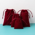 Burgundy velvet drawstring jewelry pouches shown in various sizes with a soft finish - 5*7cm / Burgundy