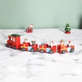 Red wooden Christmas train with Santa and snowman figures for festive tabletop decor - Classic Red / Style 05134