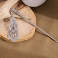 Silver retro hair stick with engraved flower and turquoise tassel on wooden blocks - Silver/F291/Hollow Pattern