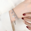 Bracciale a sfere d'argento con stella ghiacciata e ciondoli zircone su catena acciaio - 24cm / Color Acciaio