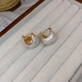 Elegant C-shaped golden hoop earrings with pearlescent white textured drop charms - White Bean Hoop (Real Gold Plated)