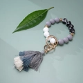 Macro shot of grey and marble silicone beads with a three-layer cotton tassel keychain - Grey Marble (#1)