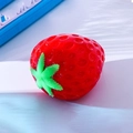 Stress relief strawberry toy in bright red and green color made of soft rubber - Big Red Flour Strawberry