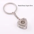 Silver rotary engine keychain with mechanical design and polished metal finish - Silver Rotary Engine