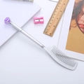 Penna gel a forma di pettine argento con diamante viola su taccuino bianco - Argento