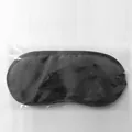 Satin-textured black polyester sleep eye mask in individual clear OPP bag packaging - Polyester Satin / Regular Style / Individual OPP Bag / Black