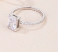 Vintage silver ring featuring emerald cut clear zirconia and pavé stones on band - US 6 / Silver