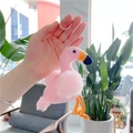 Detailed view of pink flamingo plush keychain with soft fur and silver metal ring - Plain Chain / Yellow