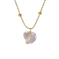 Gold beaded necklace featuring a white shell heart pendant on a clean white background - Gold