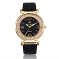 Elegant gold quartz watch with black glitter strap and crystal-studded starry dial - Black