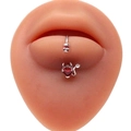 Detailed close-up of a stainless steel lip stud with a skull and red heart devil zircon - Skull Red Heart / Silver