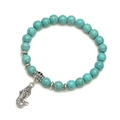 Detailed view of turquoise bead bracelet featuring a silver mermaid pendant and retro beads - Mermaid