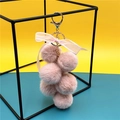 Portachiavi a grappolo di peluche rosa con fiocco di pizzo e moschettone dorato - Rosa