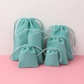 Sky blue velvet drawstring jewelry pouches in multiple sizes for gift packaging - Light Green