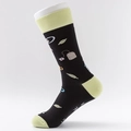 Mid-calf cotton socks in black and yellow with tea bag and tea leaf patterns - One Size / Black Yellow Tea Pattern