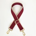 Macro view of adjustable burgundy and cream woven shoulder strap with gold metal hooks - Wine Red / Gold Hook