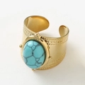 Macro view of gold stainless steel ring featuring turquoise stone and relief pattern - Adjustable Open / Turquoise Gold Wide Ring / Lake Blue