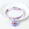 Detailed close-up of a purple daisy pattern pet collar with a cute floral pendant on a white tray - S (17-32cm) / Purple Small Daisy