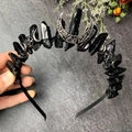 Macro detail of gothic black crystal moon headband with handmade wire wrapping - Black Crystal + Small Moon + Side Triple Moons