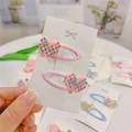 Close-up of pink rhinestone heart hair clips set on a white card display - Pastel Pearl Heart BB Clips (Pair)