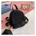 Detail of black corduroy mini backpack with D-ring buckle and front flap pocket - Black
