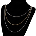 Ensemble de colliers triple rang en acier inoxydable doré et argenté sur buste - Chaîne triple couche mélangée argent et or (KN108097-Z)