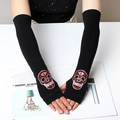 Black knitted fingerless gloves with red and silver rhinestone skull pattern on hands - 40 (Long Style) / Red