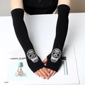 Black knitted fingerless arm warmers featuring sparkling rhinestone skull patterns - 40 (Long Style) / Gray