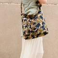 Retro corduroy tote bag with camouflage pattern shown on shoulder in a casual setting - Corduroy Camouflage