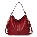 Red retro leather tote bag with bucket shape and decorative tassel hanging charm - Single Piece / Burgundy
