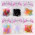 Lot de six sachets d'élastiques à cheveux épais en couleurs variées et noir classique - Emballage en sac / Patterned Hair Ties (Random Color/Bag)