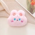 Close-up of pink plush bunny pin with detailed embroidery on a warm decorative backdrop - Original (Open Back) / Pink Rabbit