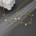Elegant stainless steel gold jewelry set with heart pendants and mother-of-pearl inlays - Heart Jewelry Set A603-N205