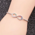 Detail of infinity charm bracelet with colorful cubic zirconia on adjustable chain - Multicolor Zircon Infinity A / Silver/Rainbow Zirconia