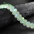 Filo di perle di cristallo verde pallido opaco traslucido con riflessi arcobaleno - 6mm/Circa 62 pezzi / Verde