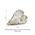White angel sculpture lying in leaf wings heart shape 17cm long 11cm high 360g decor - Sleeping Wing Left Angel Figurine