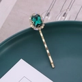 Elegante fermaglio dorato con un grande cristallo verde rettangolare e strass lucenti - Blu Scuro Stile 3