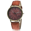 Orologio al quarzo vintage in bronzo con cinturino in pelle marrone e numeri romani - caffè