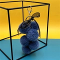 Blue faux fur grape cluster plush keychain with black polka dot bow and gold hardware - Haze Blue